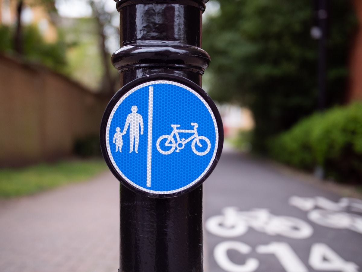 blue and black bicycle lane